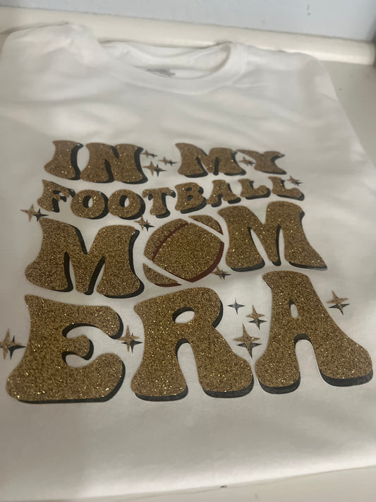 “In my football mom era” t shirt.